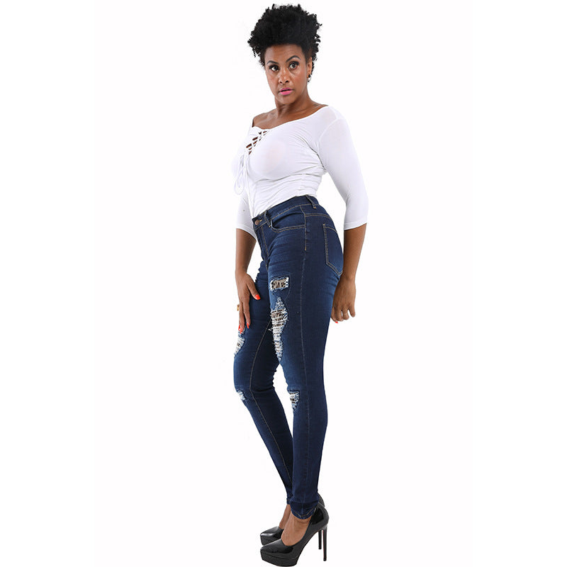 Women's Water Washed Hole Hip Raise Skinny Jeans