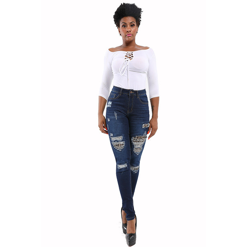 Women's Water Washed Hole Hip Raise Skinny Jeans